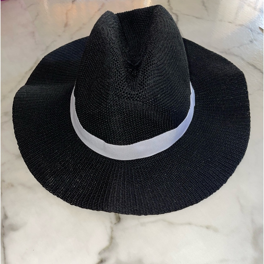 Hat o-s adjustable string,soft enough to fold and put in purse or bag never used